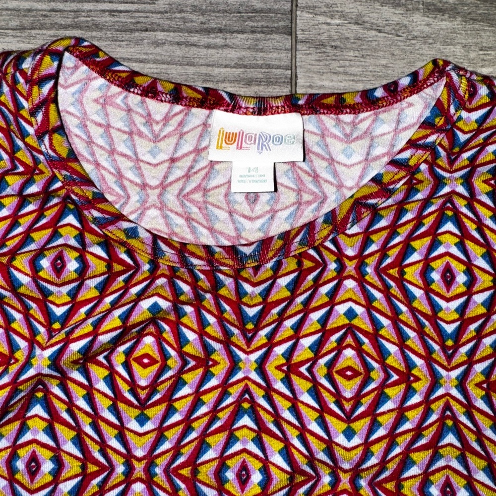 LuLaRoe Multicolor Geometric Print Girls Dress/ woman’s Top